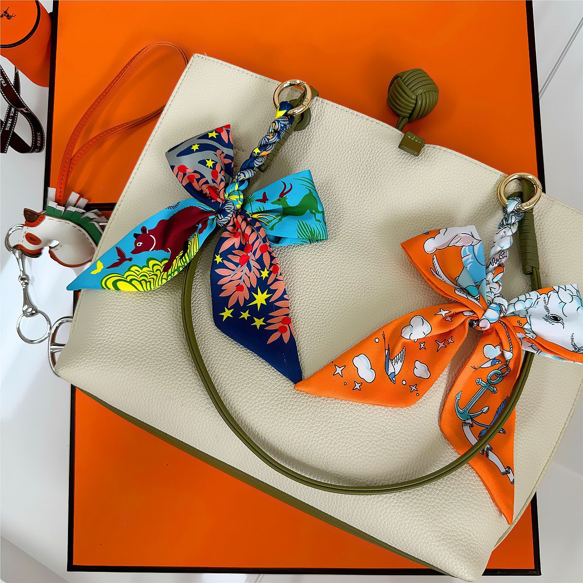 Élégant porte-clés nœud en soi - Women Bags Ysl avis et prix